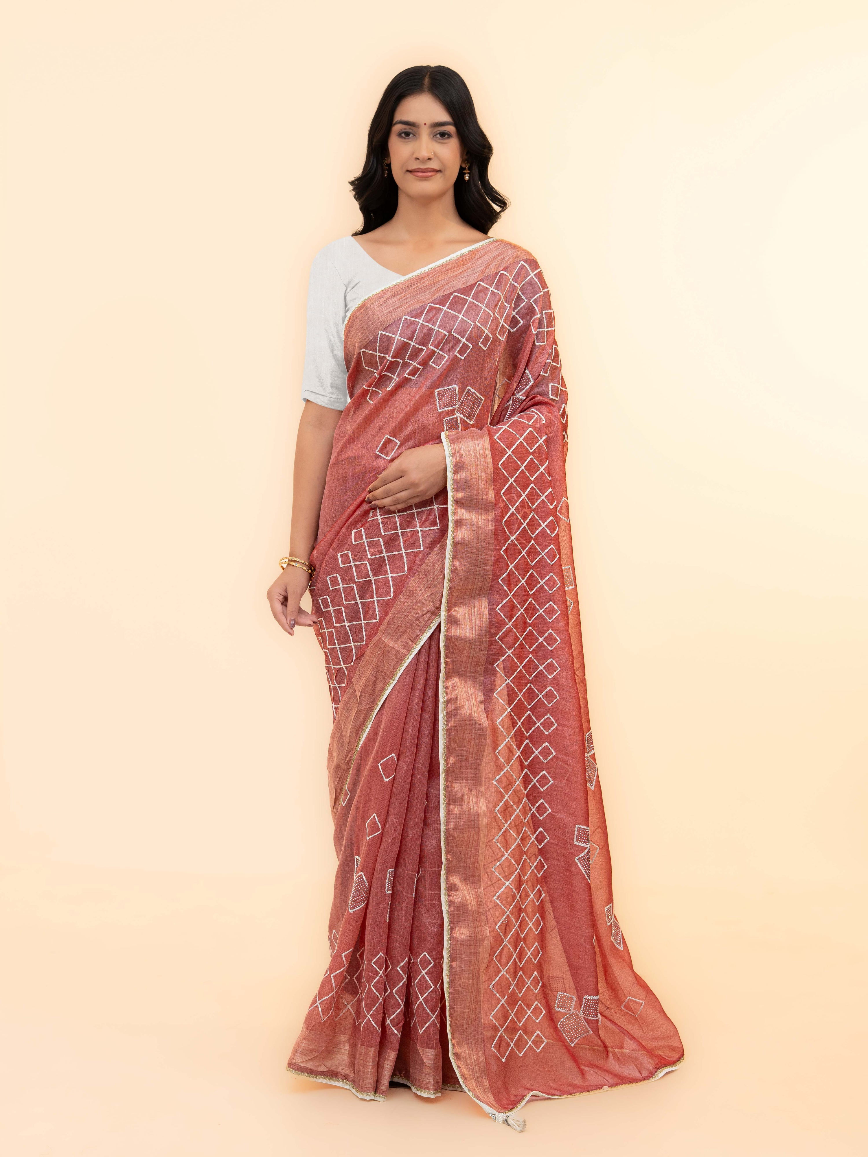 Rust Pink Tissue Silk Saree