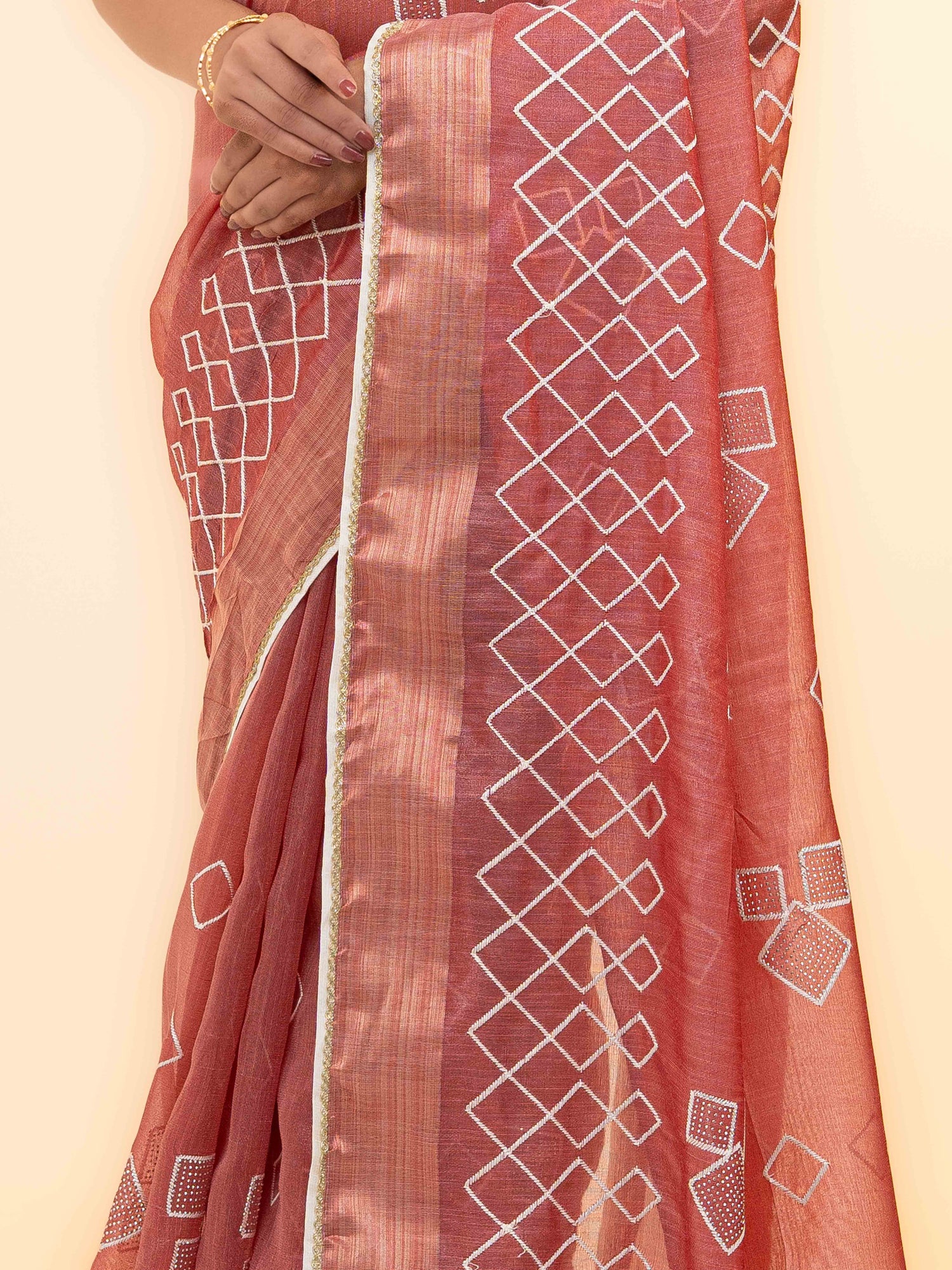 Rust Pink Tissue Silk Saree